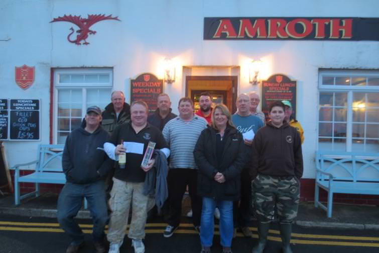 Cole collects the top Open Beach Angling award